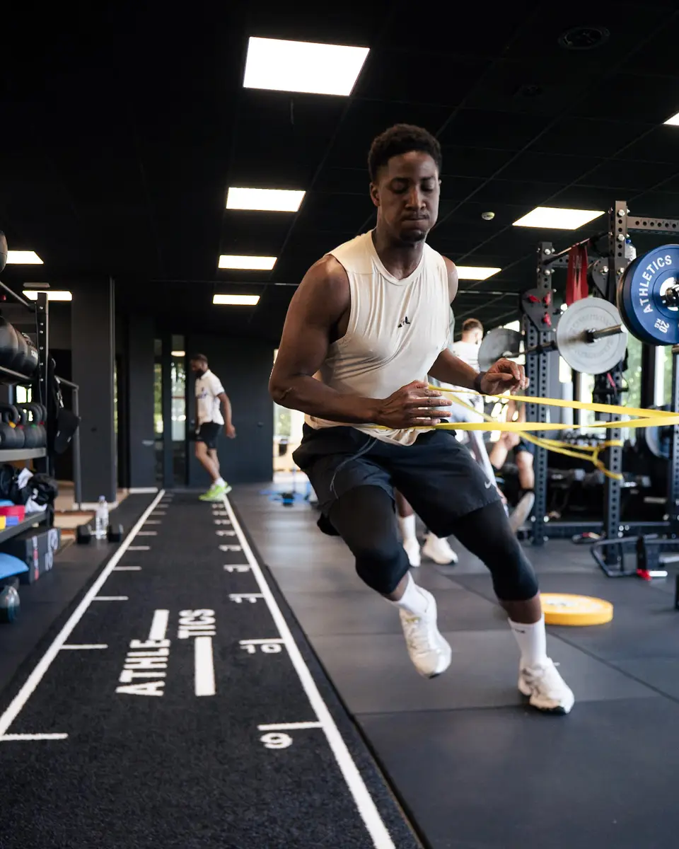 Jumping lunge with a resistance band
