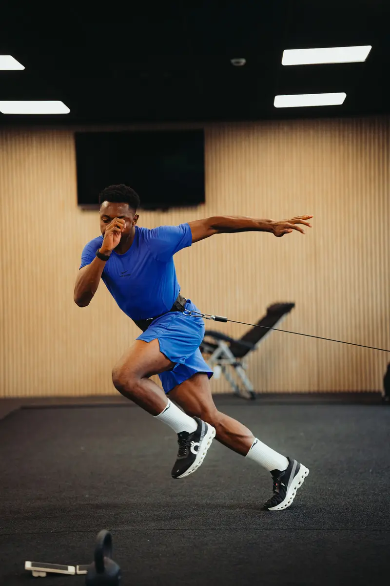Athlete performing resisted sprint work